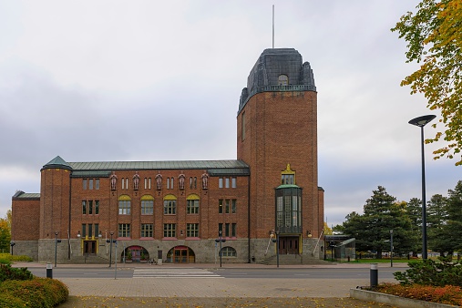 Town Hall at Joensuu, Finland, at  autumn overcast day. It was designed by Eliel Saarinen, who also designed Helsinki's train station, and was built in 1914. Part of the building now houses the local theatre and a restaurant.