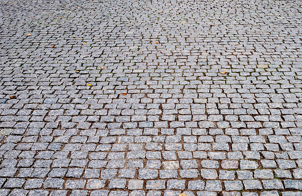 istock Perspective background of cobblestone pavement 496992763