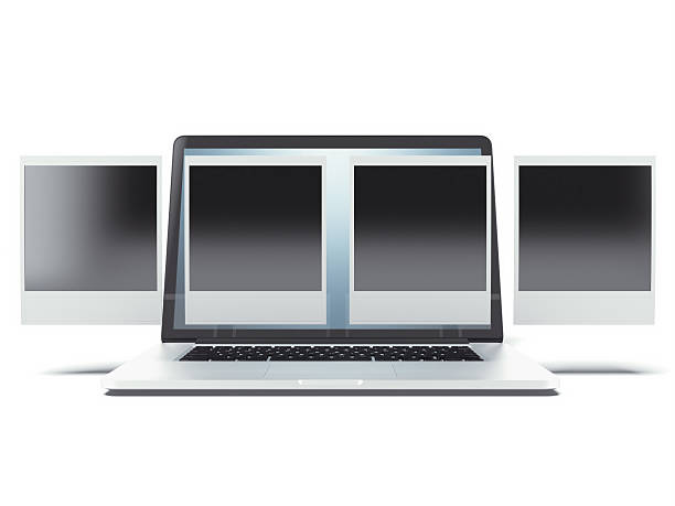 istock Blank instant photo frames over laptop 496992813
