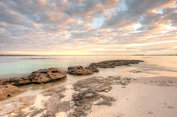 istock Pretty dappled sunrise sky  at Scottish Rocks, Australia 496992999