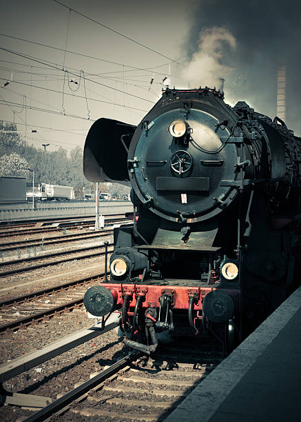 istock Historical German steam locomotive, toned image 496993609