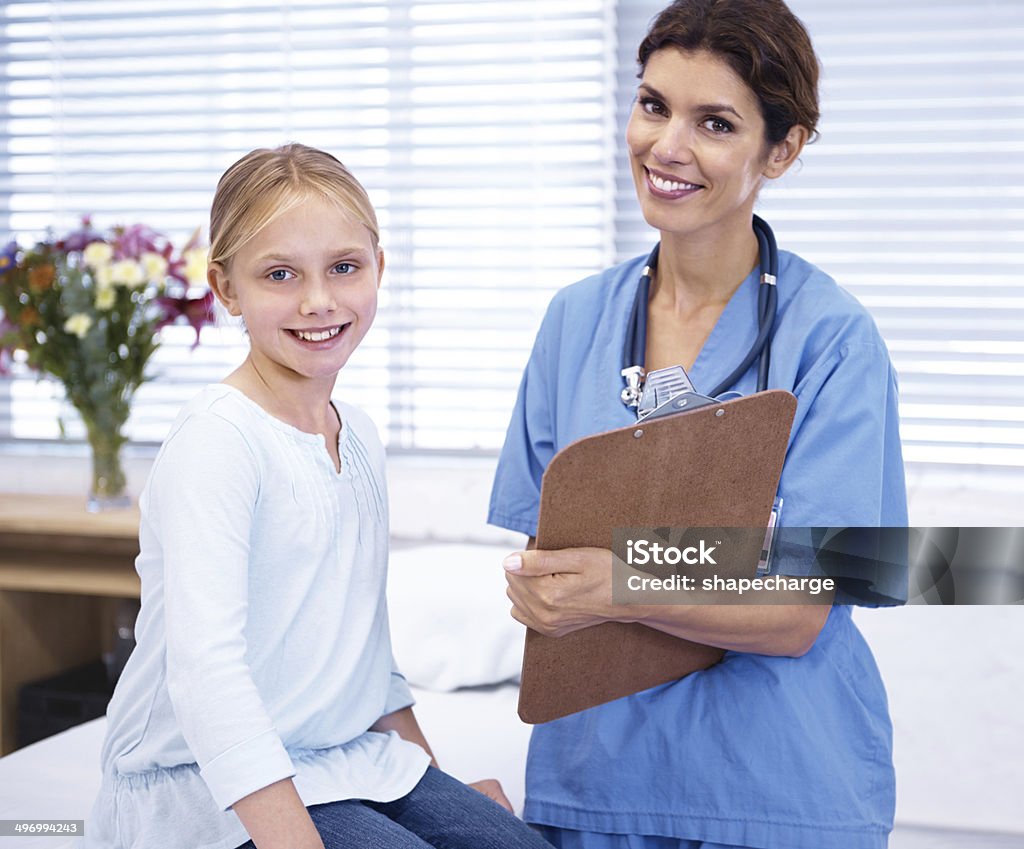 Getting the best care availible Portrait of a happy little girl getting a checkup with her doctorhttp://195.154.178.81/DATA/istock_collage/0/shoots/784432.jpg 10-11 Years Stock Photo