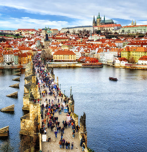 Panorama of Prague, Czech Republic Panorama of Prague with the Castle, Charles Bridge, Vltava river and red roofs of the old town, Czech Republic charles bridge photos stock pictures, royalty-free photos & images