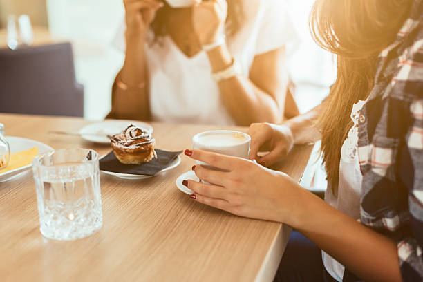 istock Two women friends at the bar 496998018