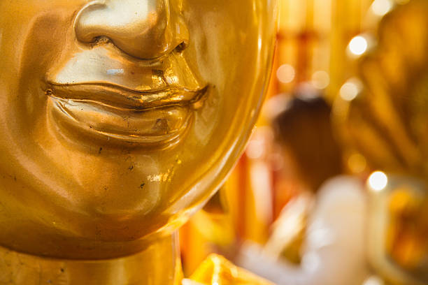 istock Golden Buddha in temple 497000588