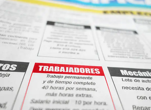 Employment section of a Spanish language newspaper with Trabajadores (Jobs) in red