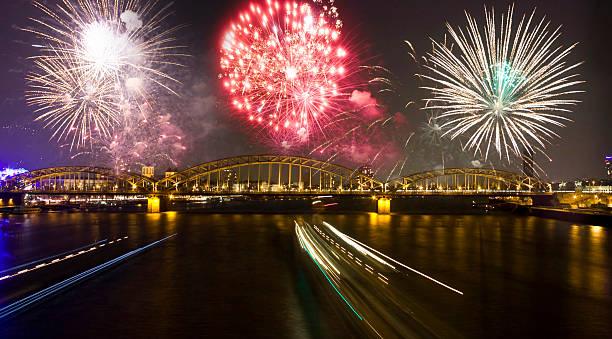 Firework over the Rhine river in Cologne, North Rhine-Westphalia, Germany