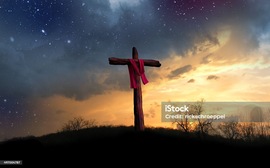 Cross and Starry Night The cross of the crucifixion of Jesus Christ as seen at night, from the scene described in the Bible. Jesus Christ Stock Photo