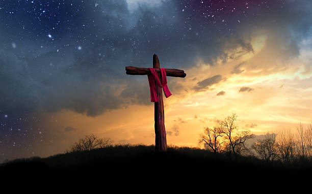 Cross and Starry Night The cross of the crucifixion of Jesus Christ as seen at night, from the scene described in the Bible. holy week photos stock pictures, royalty-free photos & images
