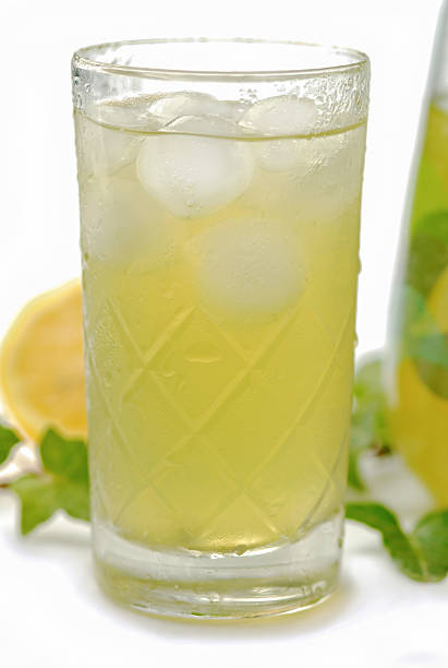 istock Glass of cold green tea with ice cubes 497005483