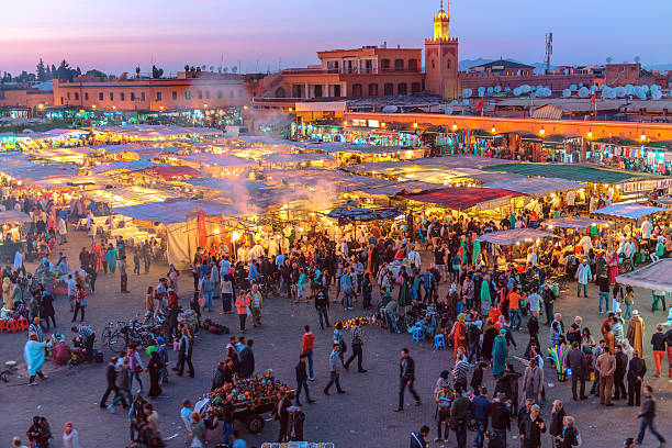 istock Evening Djemaa El Fna Square with Koutoubia Mosque, Marrakech, Morocco 497007062