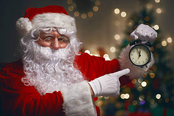 istock Santa Claus with alarm clock 497007122