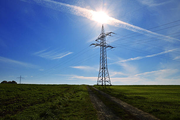 istock Electricity pylon aligned with the sun 497007220
