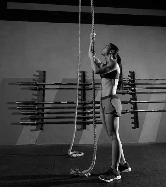 Photo of Rope Climb exercise woman workout at gym
