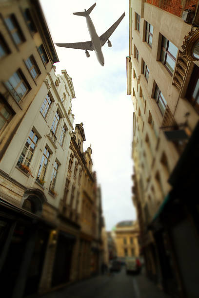 istock plane over the city of Brussels tilt - shift 497008511