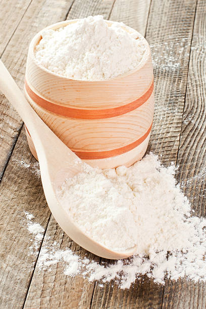 istock Flour in a wooden bowl 497008906