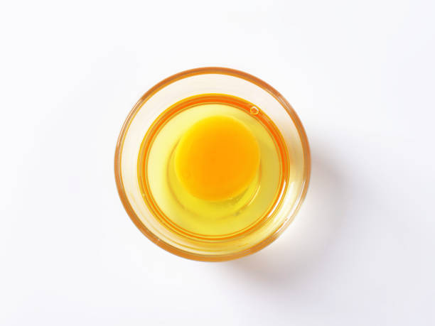 istock Egg white and yolk in glass bowl 497009488