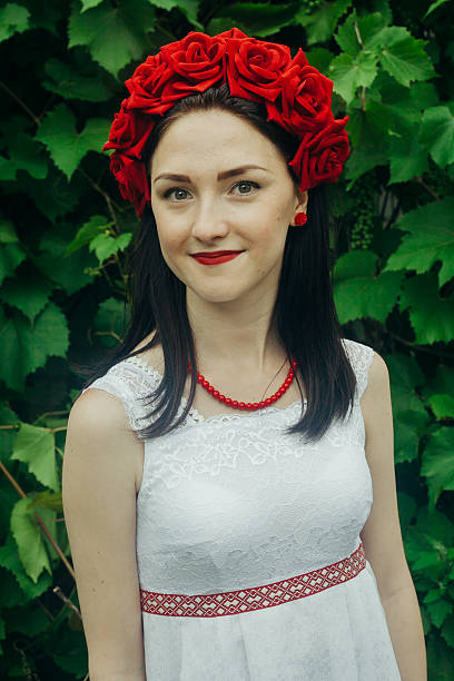 istock girl with a wreath on his head 497010998