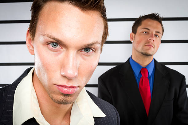 Two Suited Men Closeup Portrait stock photo