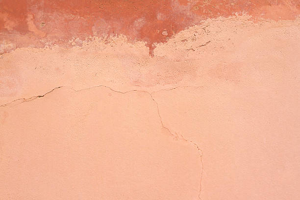 istock Old Sicilian Wall Background: Pinkish-Orange and Cracked 497012354