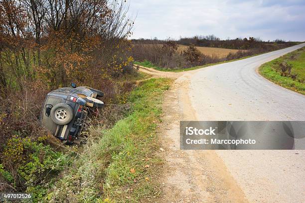 Car Skidded Off The Road And Crashed Into Ditch Stock Photo - Download Image Now - Car, Ditch, Car Accident