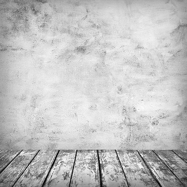 istock Empty room with concrete wall and old wooden floor 497016547