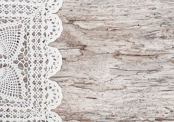 istock Lace fabric on the old wood 497017353