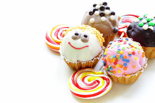 holiday desserts, different decorated cupcakes on white background