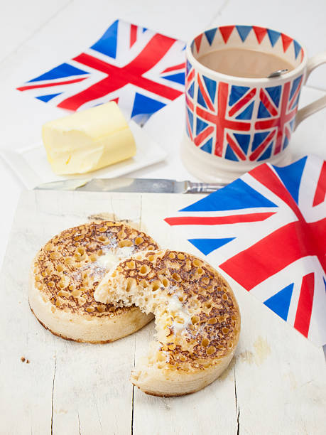 istock Buttered English crumpets with cup of tea 497018541