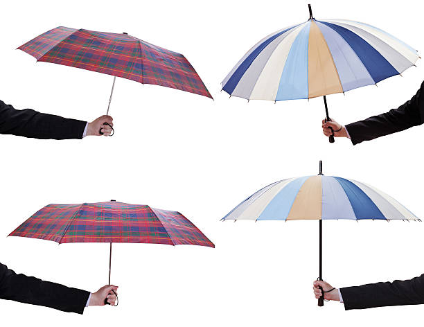 istock set of male hands with open telescopic umbrellas 497019025
