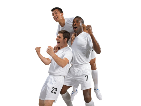 Soccer players are happy after scoring a goal
