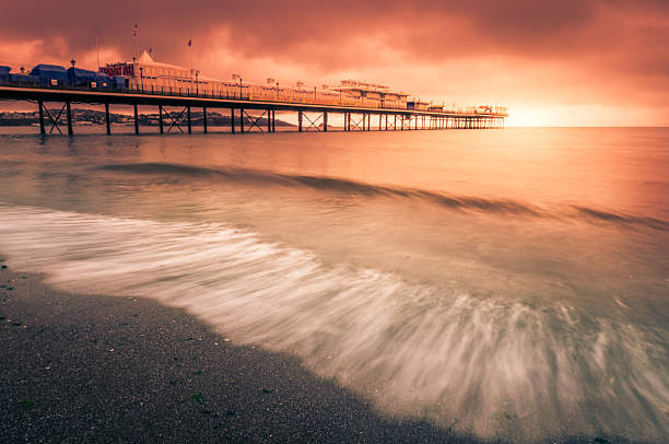 istock Paignton Pier at sunset 497021606