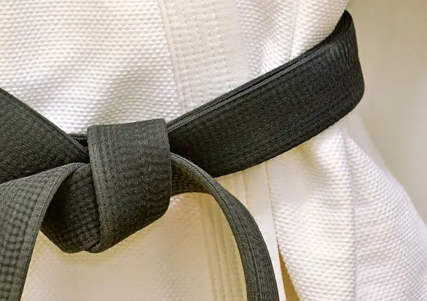 Photo of Karate Black Belt on White Uniform