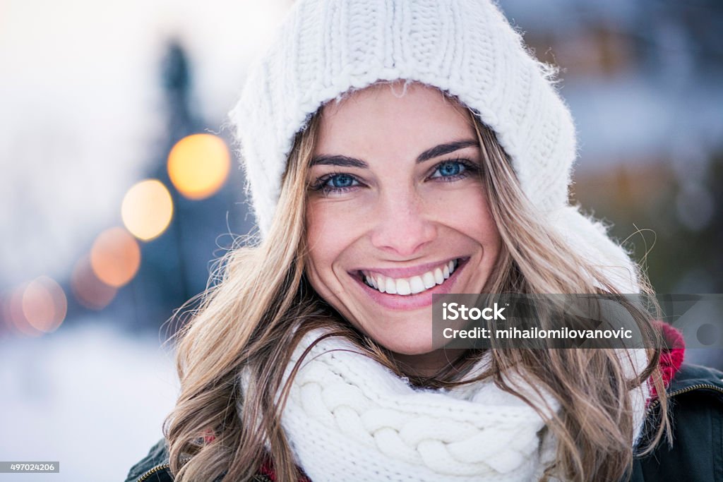 Portrait of beautiful young woman Beautiful girl smiling and posing Winter Stock Photo