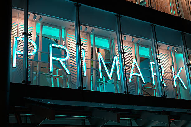 Primark store in Cologne  Cologne, Germany - October 19, 2015: Primark store in the center of Cologne at night ...... rhineland stock pictures, royalty-free photos & images