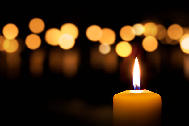 Candle Candles on dark background christmas decore candle stock pictures, royalty-free photos & images