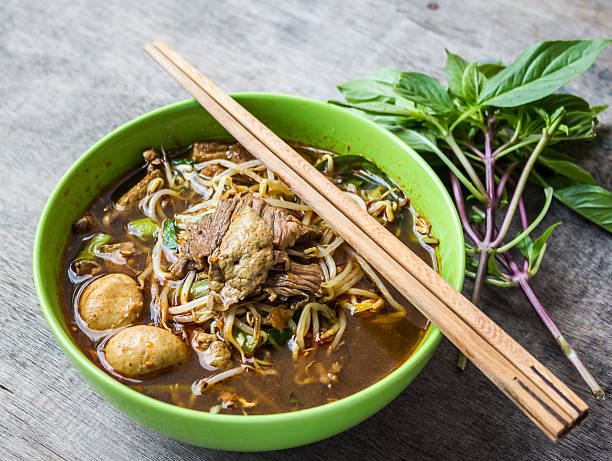 istock Bowl of thai style beef vegetable soup, Thai ekaehla 497030620