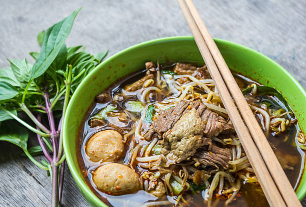 istock Bowl of thai style beef vegetable soup, Thai ekaehla 497030744