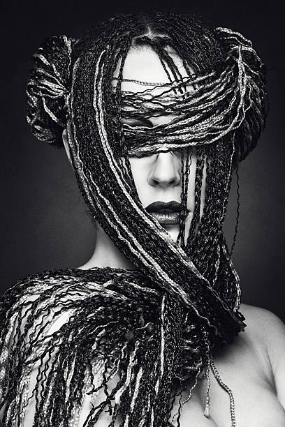 istock Girl with many small braids 497031022