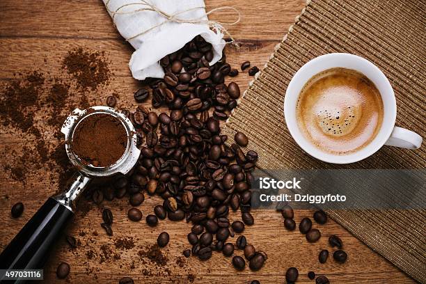 Espresso On A Wooden Table Stock Photo - Download Image Now - Roasted Coffee Bean, Espresso, Coffee - Drink