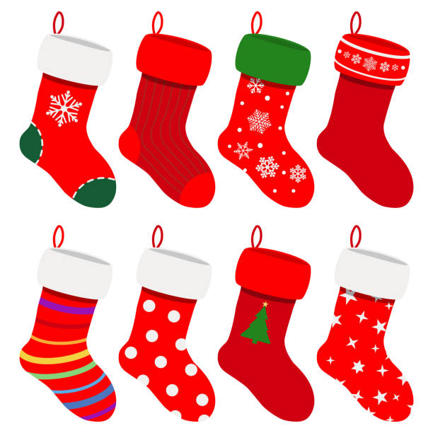 Set of Christmas socks Set of Christmas socks in red colors with various patterns. Vector illustrations. EPS10, JPG and AI10 are available christmas stocking stock illustrations