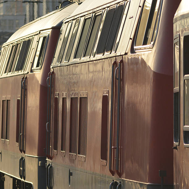 Regional Train departing Munich A regional train with two Diesel locomotives seen in Munich Nahverkehrszug stock pictures, royalty-free photos & images