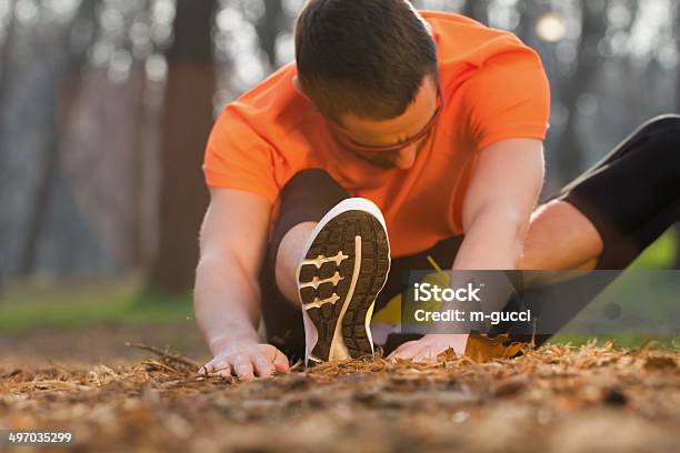 Stretching After Jogging Stock Photo - Download Image Now - 30-39 Years, Activity, Adult