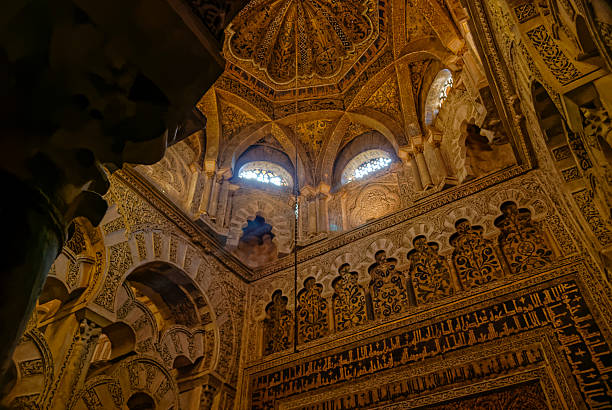 View of the interior of the mosque-Cathedral of Cordoba. Light gathering for prayer.