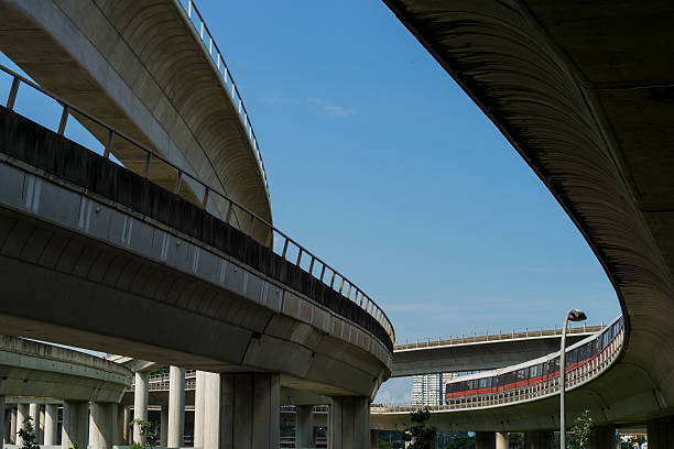 istock Viaduct of Singapore MRT train system with train 497036567