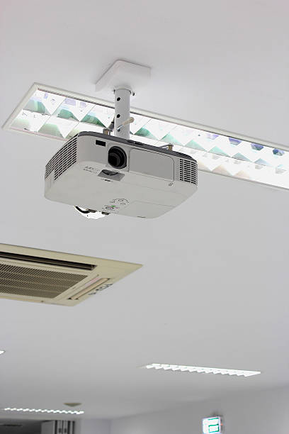 istock Universal projector ceiling in the conference room. 497037139