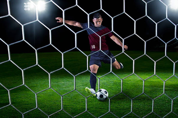 istock Hispanic Soccer Player ready to shoot during a game 497039601