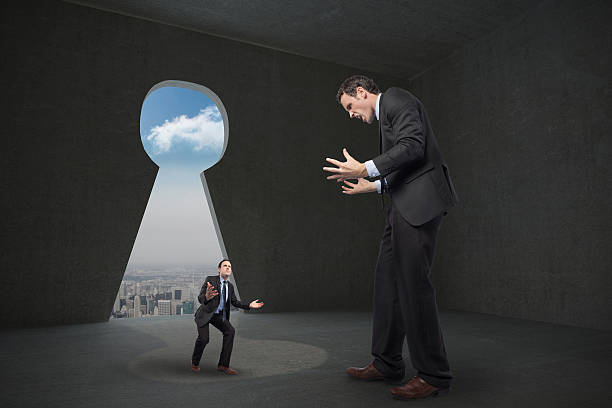 istock Composite image of stressed businessman gesturing over tiny busi 497040755