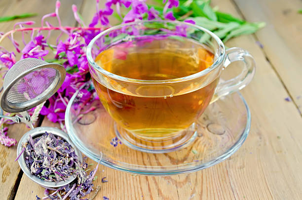 istock Herbal tea from fireweed in a glass cup with strainer 497041473