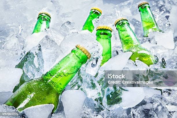 Cold Beer Bottles On Ice Stock Photo - Download Image Now - Ice, Beer - Alcohol, Water Cooler
